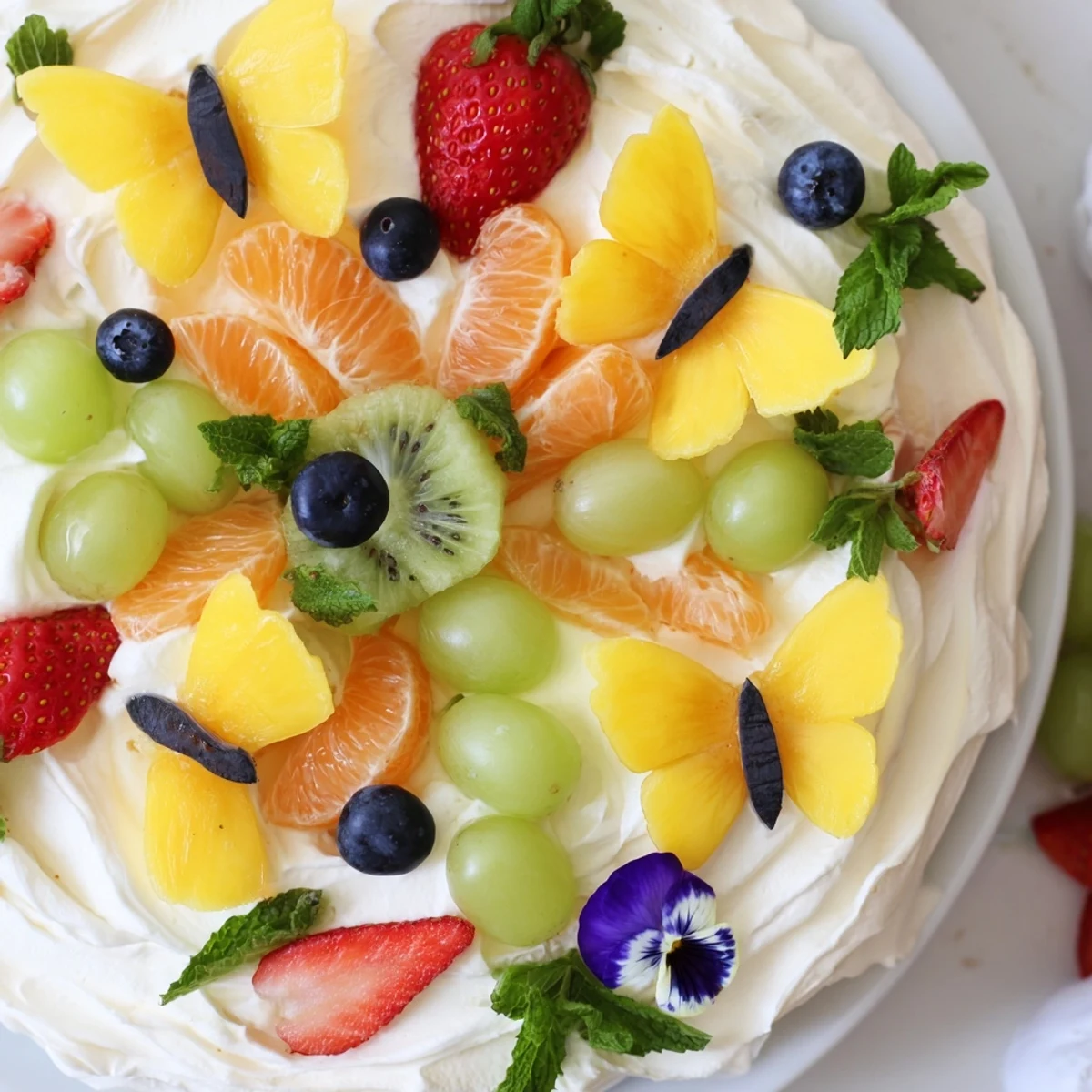 Butterfly Fruit and Cream Cheese Board artfully arranged with colorful fruit and creamy cheese for guests.
