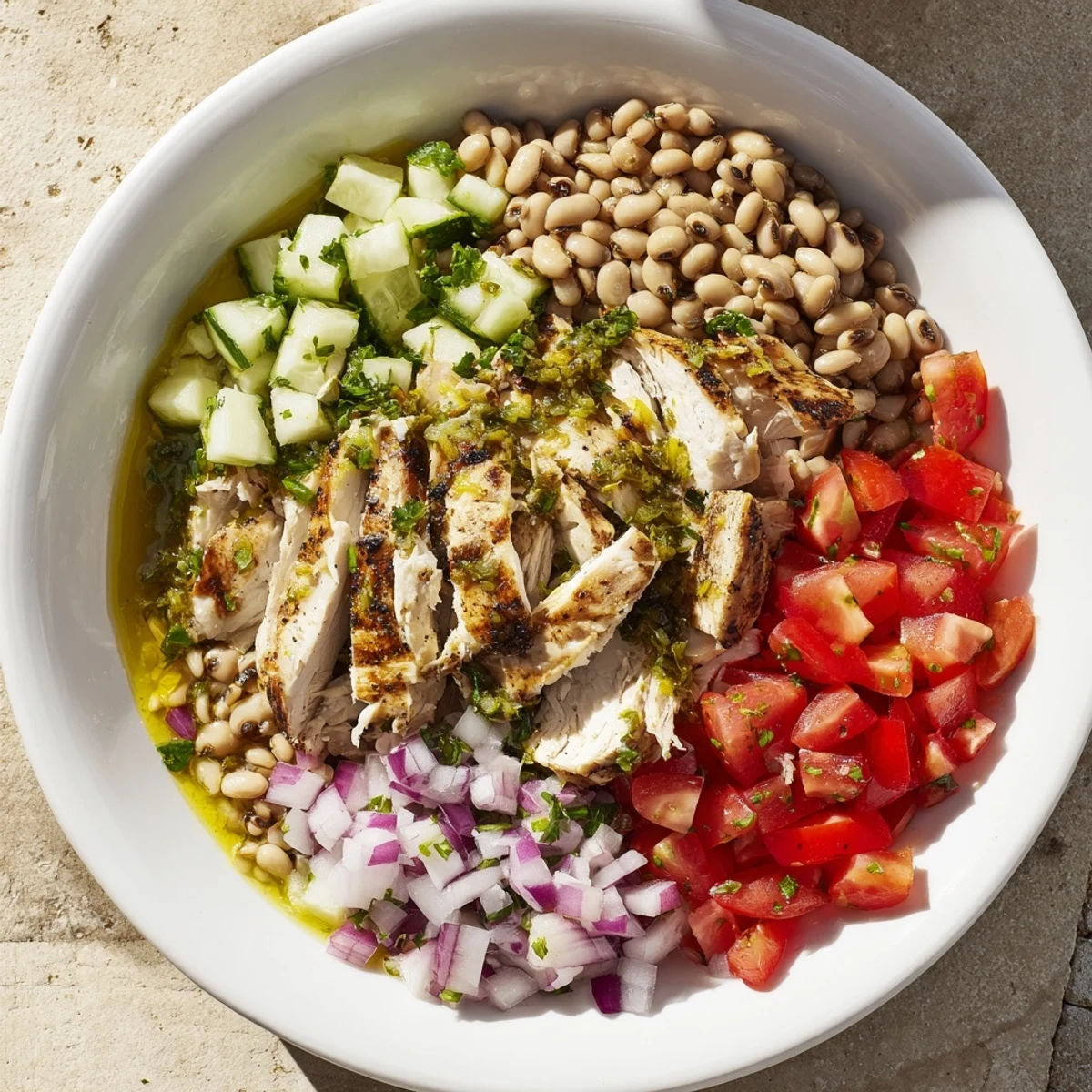 Dense Bean Salad with Lemon-Dill Chicken: A colorful, Mediterranean dish featuring juicy shredded chicken and fresh herbs.