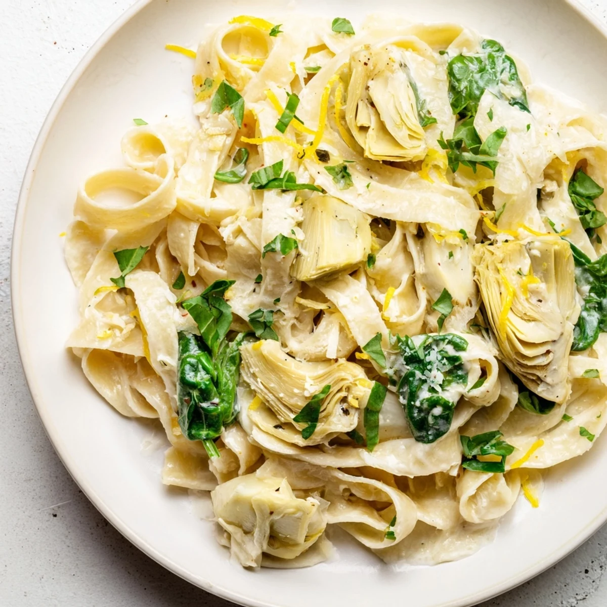 This delicious Creamy Lemon Artichoke Pasta showcases a perfectly balanced, zesty, and creamy Italian dish.