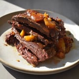 Fork-tender Slow Cooker Mississippi Roast, juicy and delicious, ready to serve with mashed potatoes.