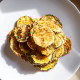 These homemade zucchini chips are perfectly seasoned, offering a delightful crunch and fresh flavor.