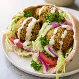 Golden-brown falafel nestled in a warm pita pocket, perfect for a satisfying vegetarian meal.