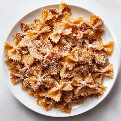Golden-brown Air Fryer Pasta Christmas Crack, a sweet and salty holiday snack, ready to enjoy.
