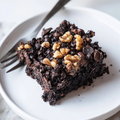 Fudgy, rich black bean brownies, baked to perfection with melty chocolate chips on top.