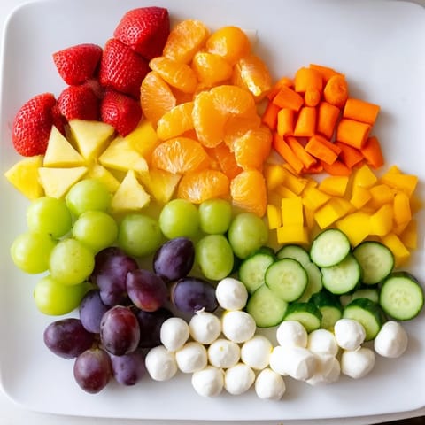 Rainbow Cloud Snack Board bursting with colorful fruits, a fun and delicious healthy snack.