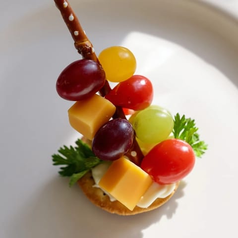 Vivid image of assembled Up, Up & Away Hot Air Balloon Snacks, a cheerful snack idea for kids' parties.
