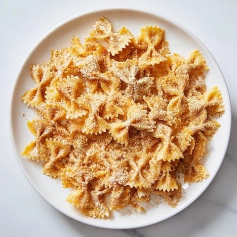 Crispy, sugared Air Fryer Pasta Christmas Crack, perfect for a crunchy, flavorful holiday treat.