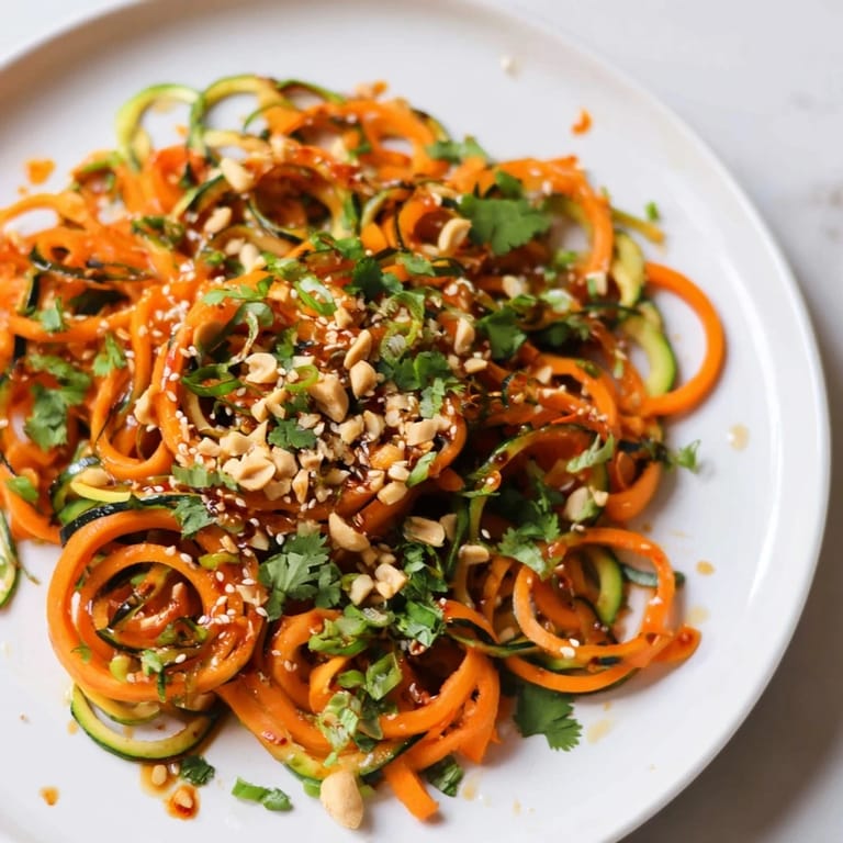 Get a close-up of this delicious Spicy Cucumber Noodle Bowl, perfect for a quick and light meal.