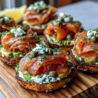 Vibrant Mother's Day Brunch Smoked Salmon Bagel Board with fresh dill and lemon.
